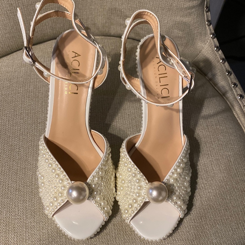COPY - Brand New out of the box, never been worn, pearl heels.
